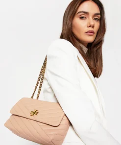 Tory Burch Kira chevron convertible shoulder bag.
